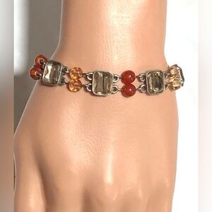 Avon Silver Bracelet with Orange Accents